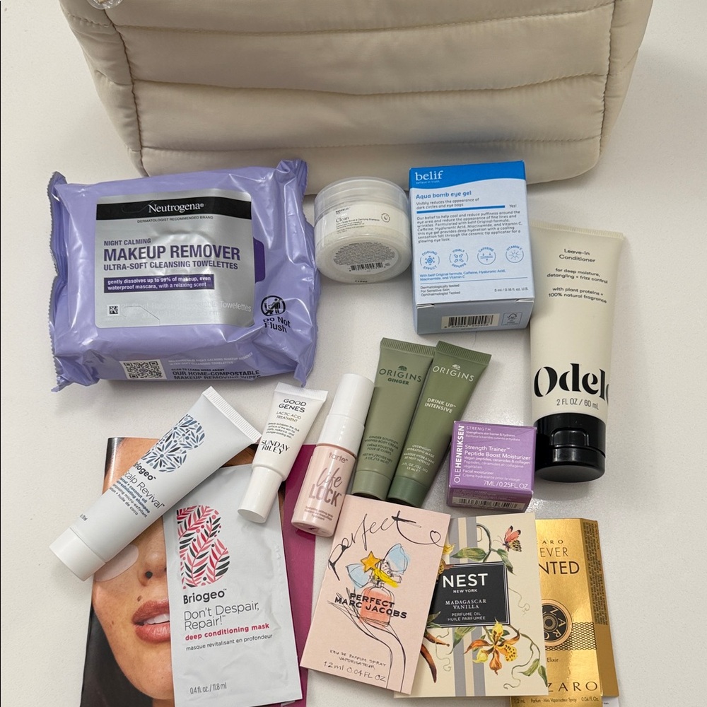 Assorted Skincare and Beauty products with cosmetic bag